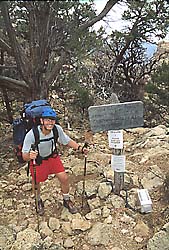 Backpacker smiles on reaching the top of the Red Canyon (New Hance) trail. Grand Canyon National Park.  (c) Rob Kleine, All Rights Reserved.  www.gentleye.com